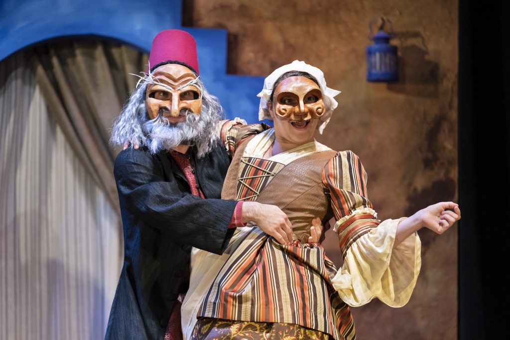 Two actors in masks